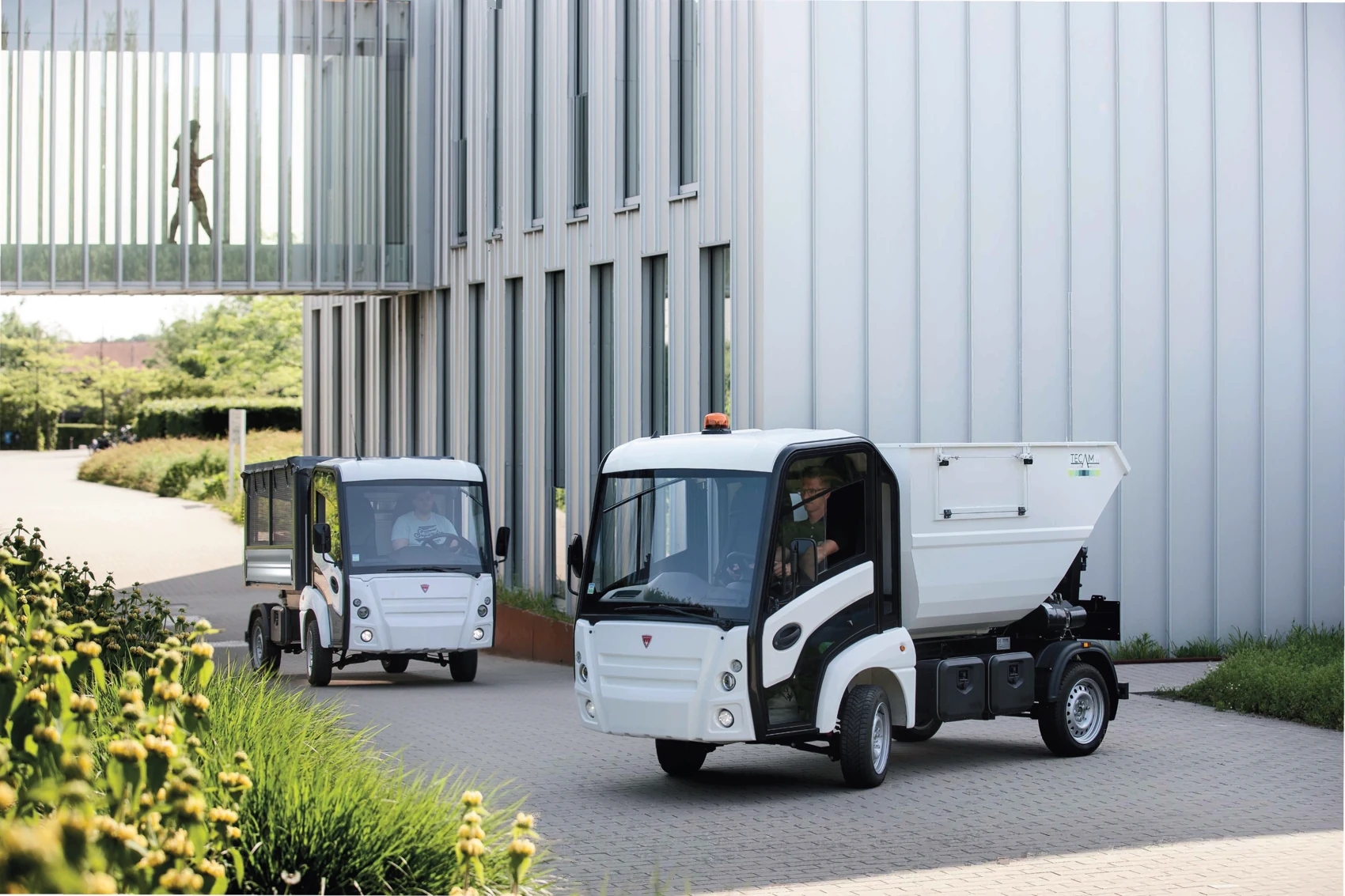 Narro vehicle shown in a facility setting